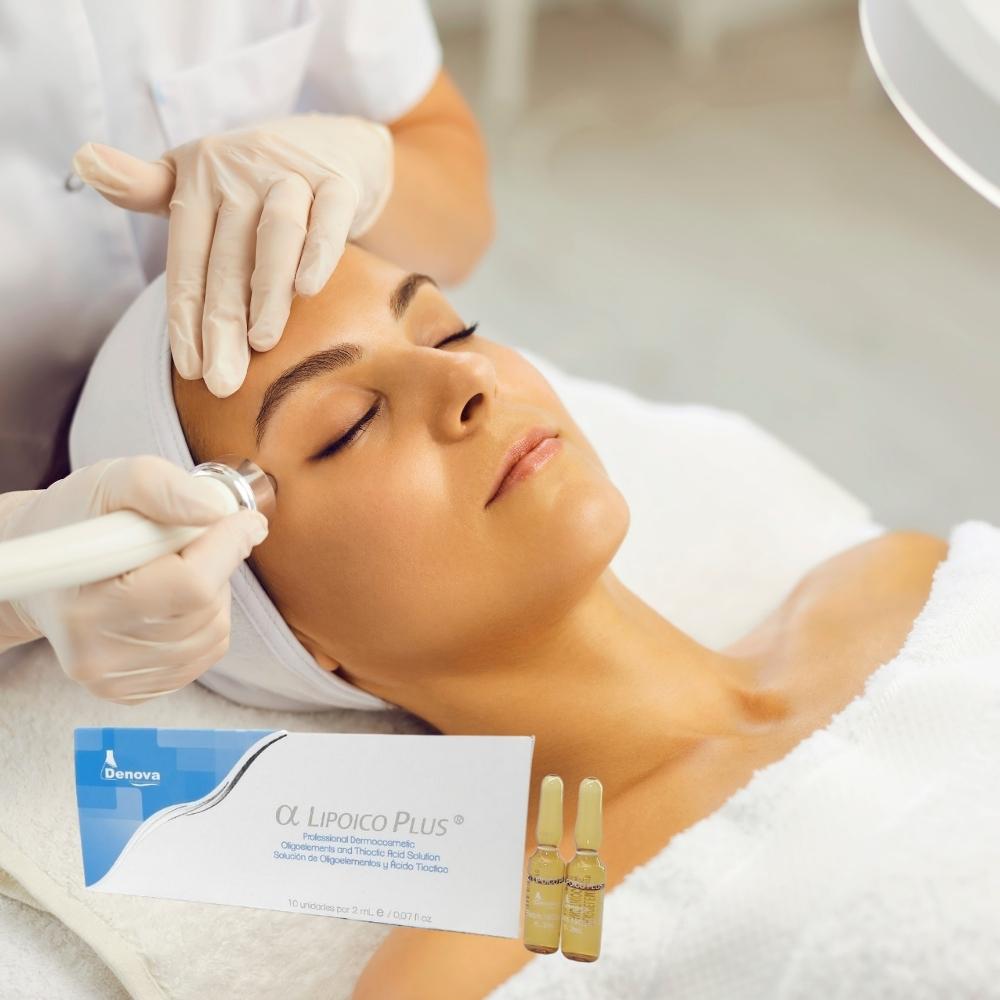 Beautician doing facial treatment on the face of and box of Alpha Lipoic Plus ampoules